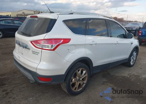 2015 Ford Escape Titanium z USA, uszkodzony, nr VIN 1FMCU0J93FUB60403